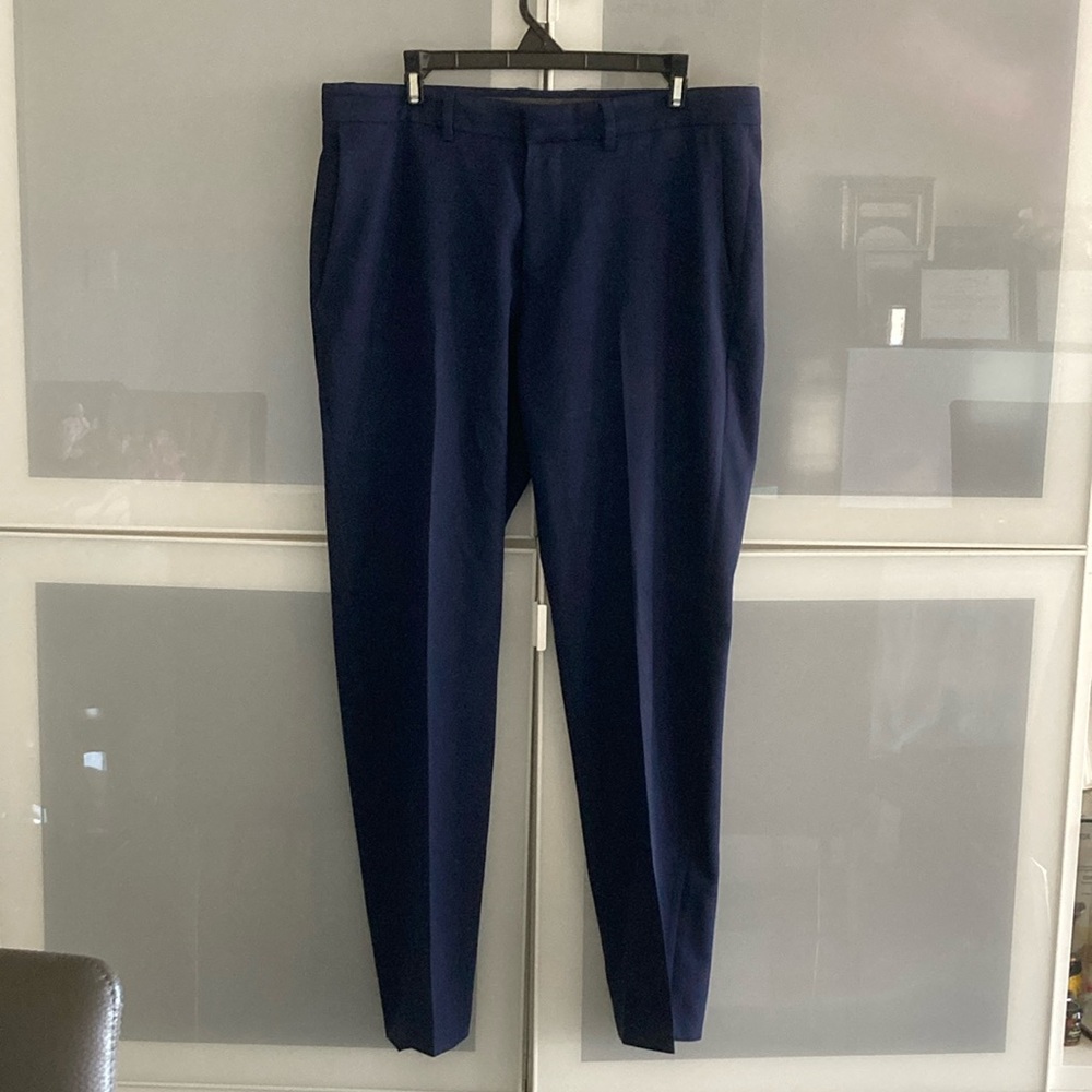 Men's Navy Pants
Hem needs to be sewed